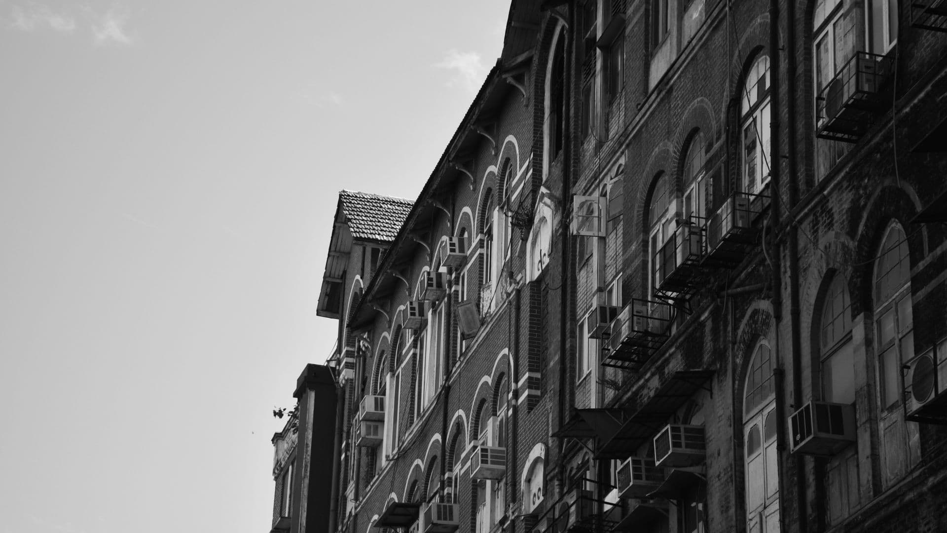 The facade of an older Mumbai society building