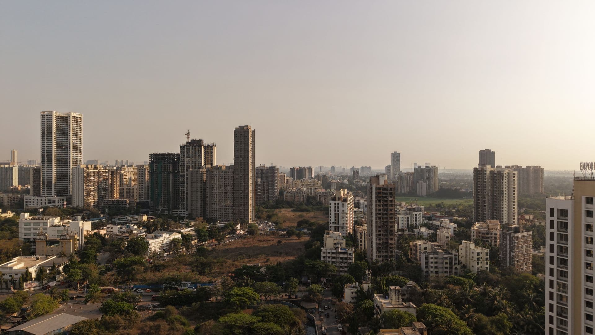 Mumbai from above, dense residential blocks to the horizon
